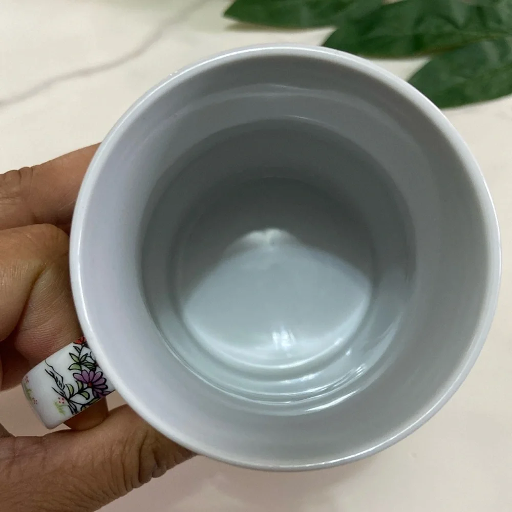 Asian Lady’s Collectible Coffee Cup